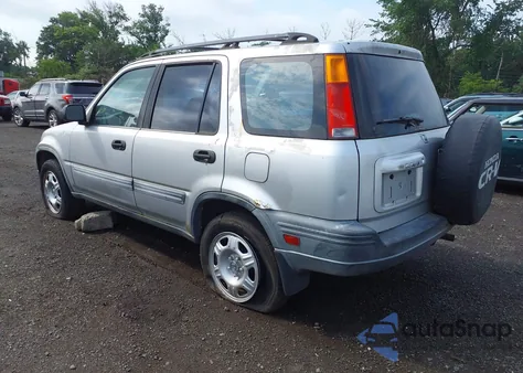 1999 Honda Cr-V Lx z USA, uszkodzony, nr VIN JHLRD1841XC024361